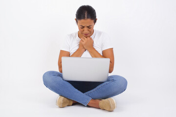 Sad pretty girl feeling upset while spending time at home alone. Beautiful young blonde female with...
