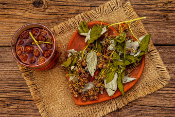 Dry leaves, flowers and berries of raspberry for cooking healthy herbal tea