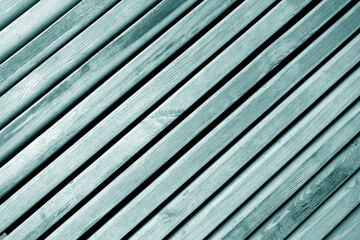 Weathered wooden planks texture with gaps. cyan toned