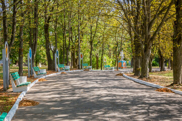Sculptures and flowers in the autumn park
