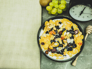 Breakfast cereals with milk and fruits