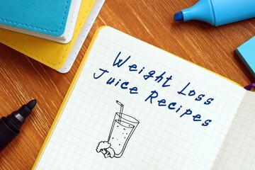 Weight Loss Juice Recipes phrase on the piece of paper.