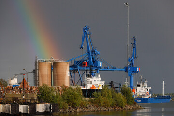Obraz premium Oxelosund, Sweden The port of Oxelosund in the rain and rainbow.