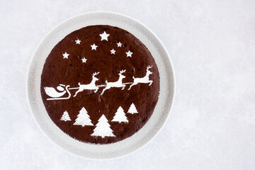 Chocolate Cake with Christmas Theme on Grey Background