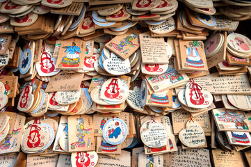 Monkey 'ema' plaques hanging at Hie Shrine, Akasaka, Tokyo. The monkey is the symbol of Hie Shrine.