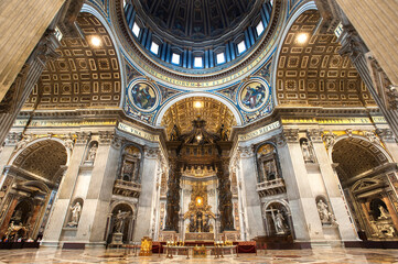 St. Peter's Baldachin in the nave of St. Peter's Basilica. The Baldachin is a large Baroque sculpted canopy positioned over the high altar, directly under the main dome.