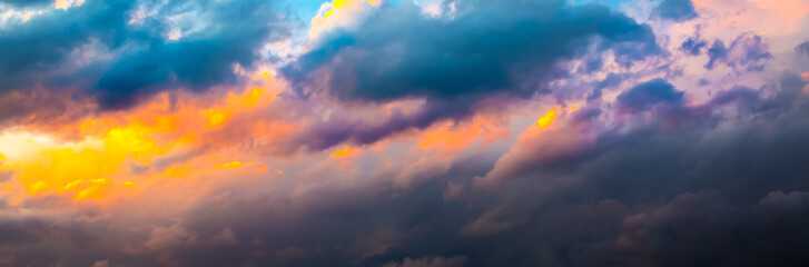 Beautiful dramatic sky. Sunset or sunrise time. Amazing purple clouds.