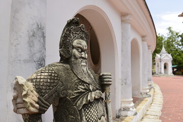 The Ancient Chinese warrior sculpture statue around Golden pagoda Phra Pathom Chedi at Nakhon Pathom province, Thailand.