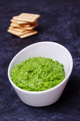 Green sauce in a ceramic bowl