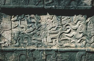 Closeup of carved Maya figures in a Mayan temple in Chichen Itza, Yucatan, Mexico