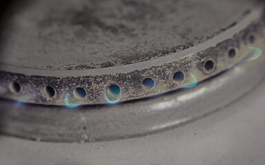 burning the gas on the stove. Burner gas stove, concept of energy