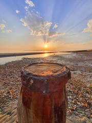 sunset on the rocky beach