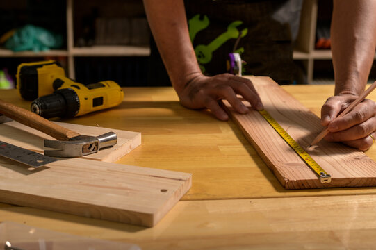 Carpenter working with equipment.Concept you can maker.