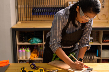 Asia women working with equipment.Concept you can maker.