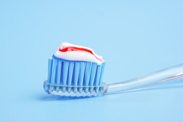 toothbrush with tricolor toothpaste on it