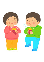 熱々の焼き芋を食べる男の子と女の子