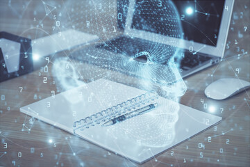 Multi exposure of work table with computer and brain hologram. Brainstorm concept.