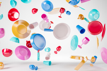 Multicolored cooking accessories, plates, dishes, skillet, glasses falling down. Cooking concept with copy space.