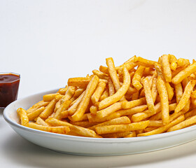 Portion of french fries served on plate on white background