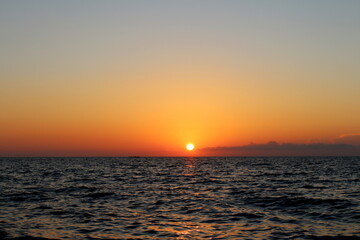 Obraz premium The sunset over the Tyrrhenian Sea on the coast of Tuscany