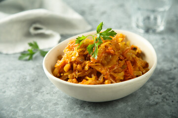 Traditional homemade cabbage stew with bay leaf