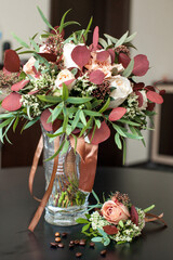 Wedding bouquet of flowers from white red rosebuds