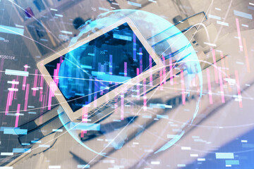 Financial graph colorful drawing and table with computer on background. Double exposure. Concept of international markets.