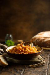 Traditional homemade cabbage stew with bay leaf