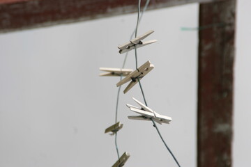 clothes pegs on a hanging line