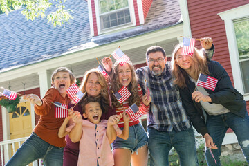 All American Family Celebrating Waving USA Flags