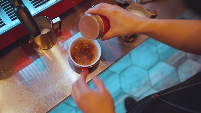 Barista making latte art in cafe , top view