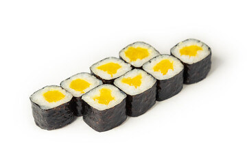 Sushi roll with takuan on a white plate, classic Japanese sushi. Traditional Japanese food with maki. Delicious pieces of sushi. For the restaurant menu. copyspace