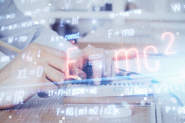 Student or teacher with mathematical and scientific formulas. Concepts of education.