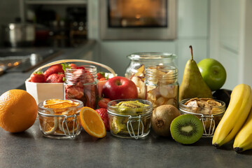 Dried fruits and fruit chips along with the fresh fruit of which they are made.