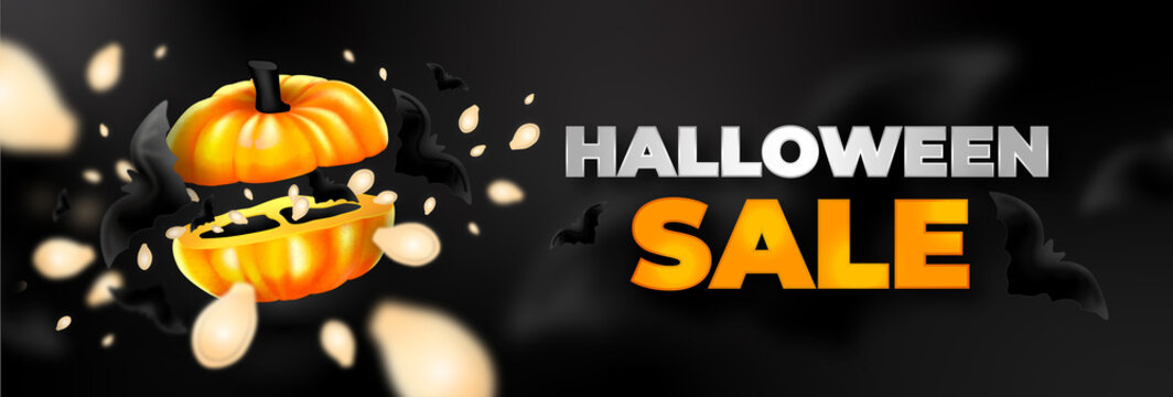 Halloween sale  with a cut pumpkin and splesh of seeds on a black background