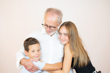 Portrait of a grandfather with his grandchildren