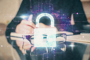 Multi exposure of woman's hands making notes with lock icon. Concept of security and protection of data