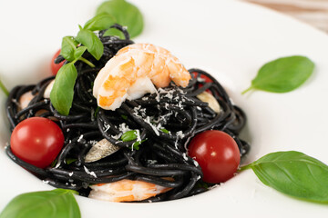 Black Spaghetti with Shrimps on White Restaurant Plate