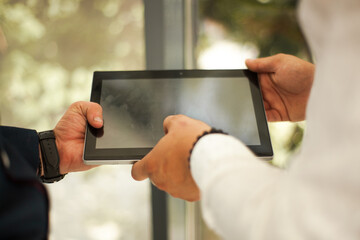 businessman using tablet computer