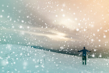 Back view of tourist hiker in warm clothing with backpack standing with raised arms on clearing covered with snow on spruce forest mountain and cloudy sky copy space background.