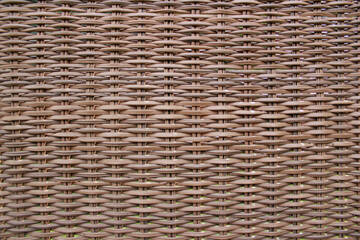 Obraz premium braided rattan texture of a chair backrest