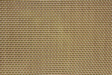 braided rattan texture of a chair backrest