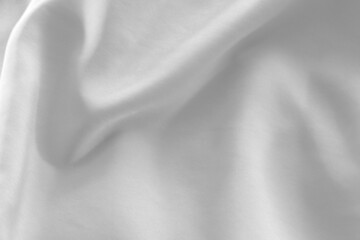 White cloth background abstract with soft waves.