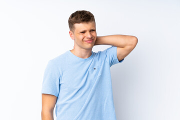 Young handsome man over isolated white background with neckache