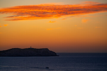 Naklejka na ściany i meble Ibiza sunset. Sa Conillera island. Spain.