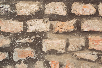 Stone wall as a background or texture. Vintage stone wall.