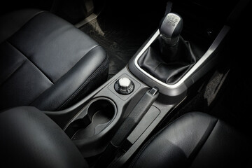 automatic transmission shift selector in the car interior. Closeup a manual shift of modern car gear shifter.