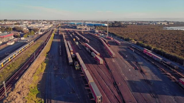 Aerial Over A Rail and Freight Yard With Containers In Transit, Auckland, New Zealand