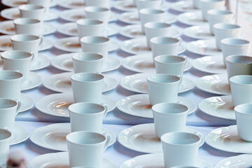 Stack row of white coffee cup. background concept for meeting conference seminar and party.