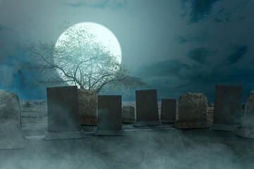 Tombstones on the graveyard on the meadow